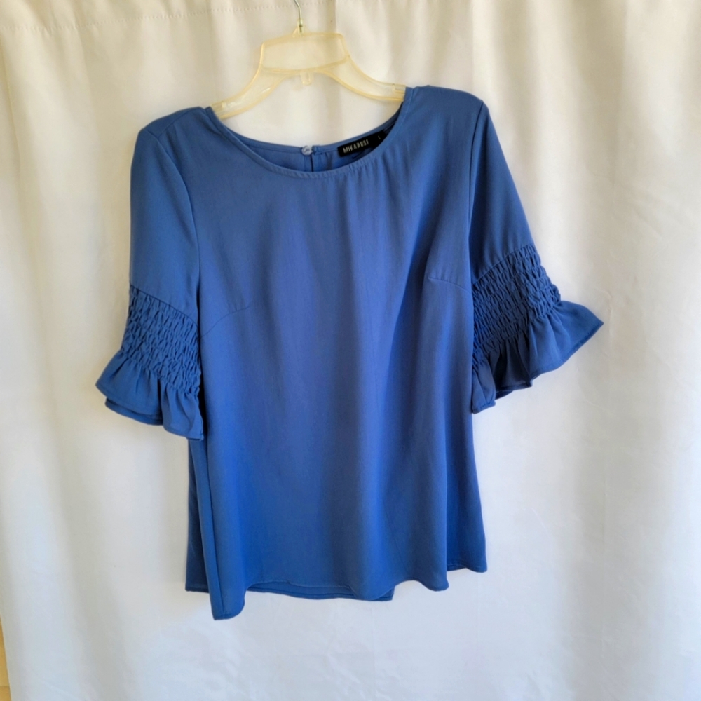 Mikarose NWT blue blouse. SZ L. Polyester 3/4 sleeves.
